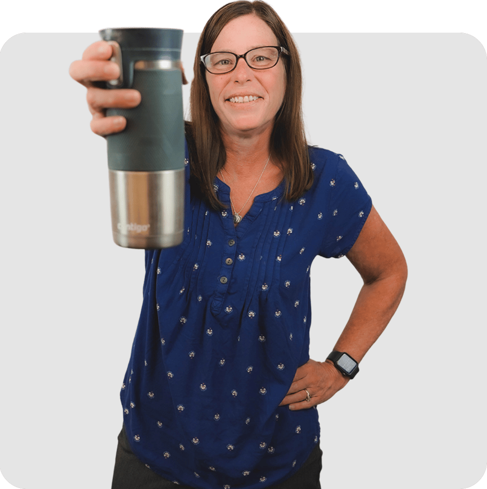 Tracy Collins holding a mug