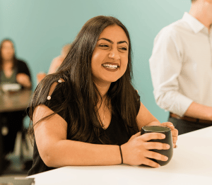 a woman sitting on a table