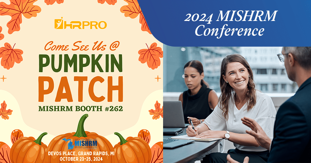 a woman sitting in front of a laptop